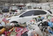 Китайські сміттярі по-своєму провчили автомобіліста (5 фото)